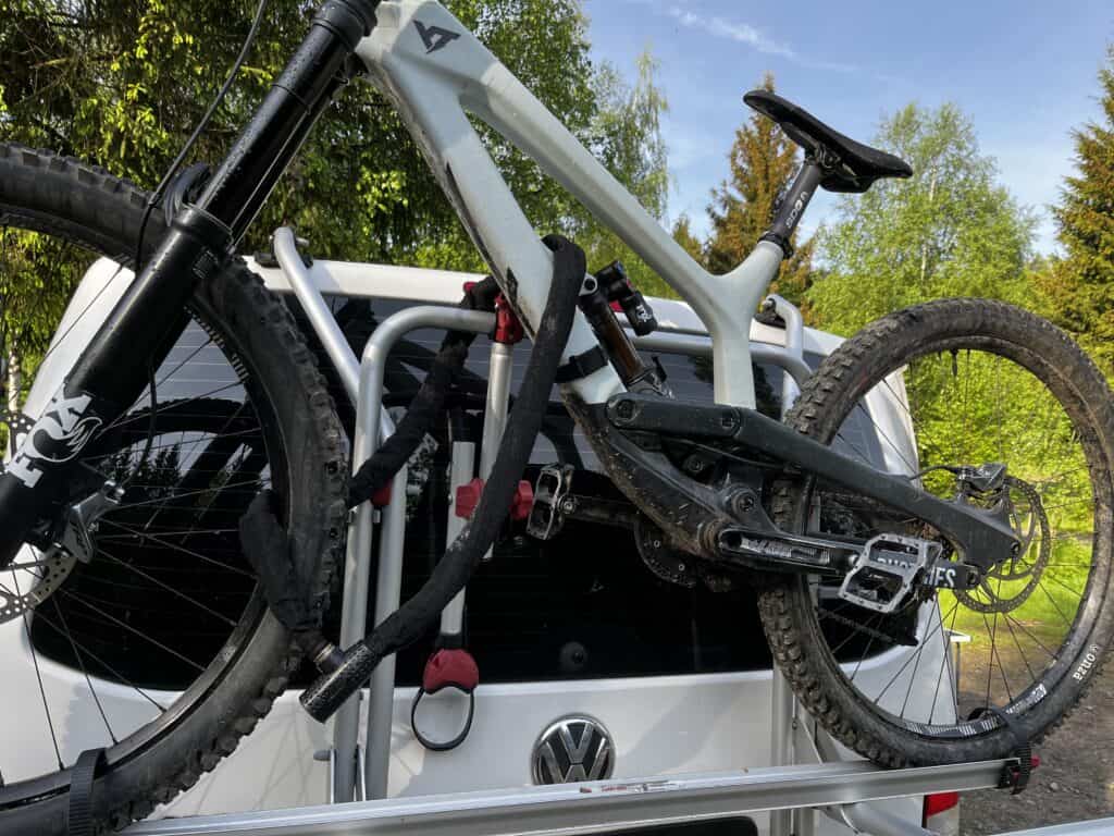 mountain bike locked to a trunk bike rack